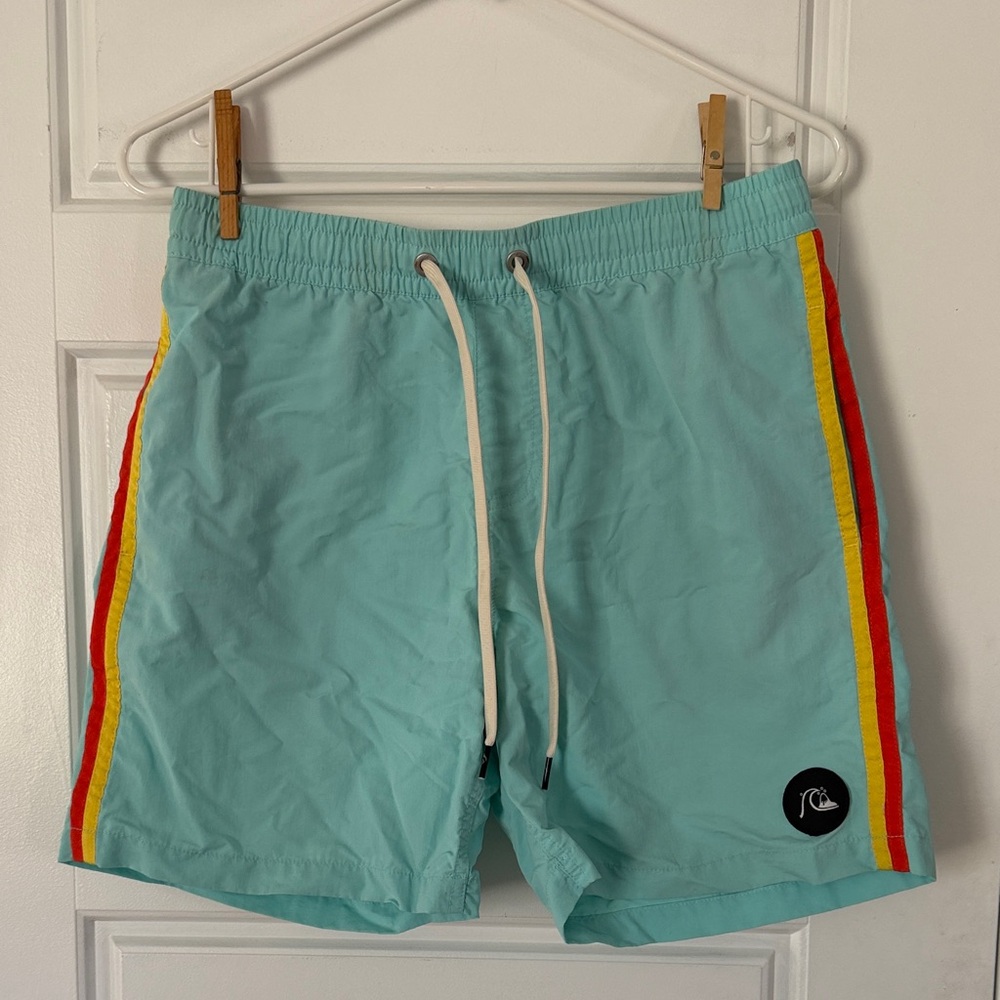 Quiksilver Light Blue Swim Shorts with Red and Yellow Stripes